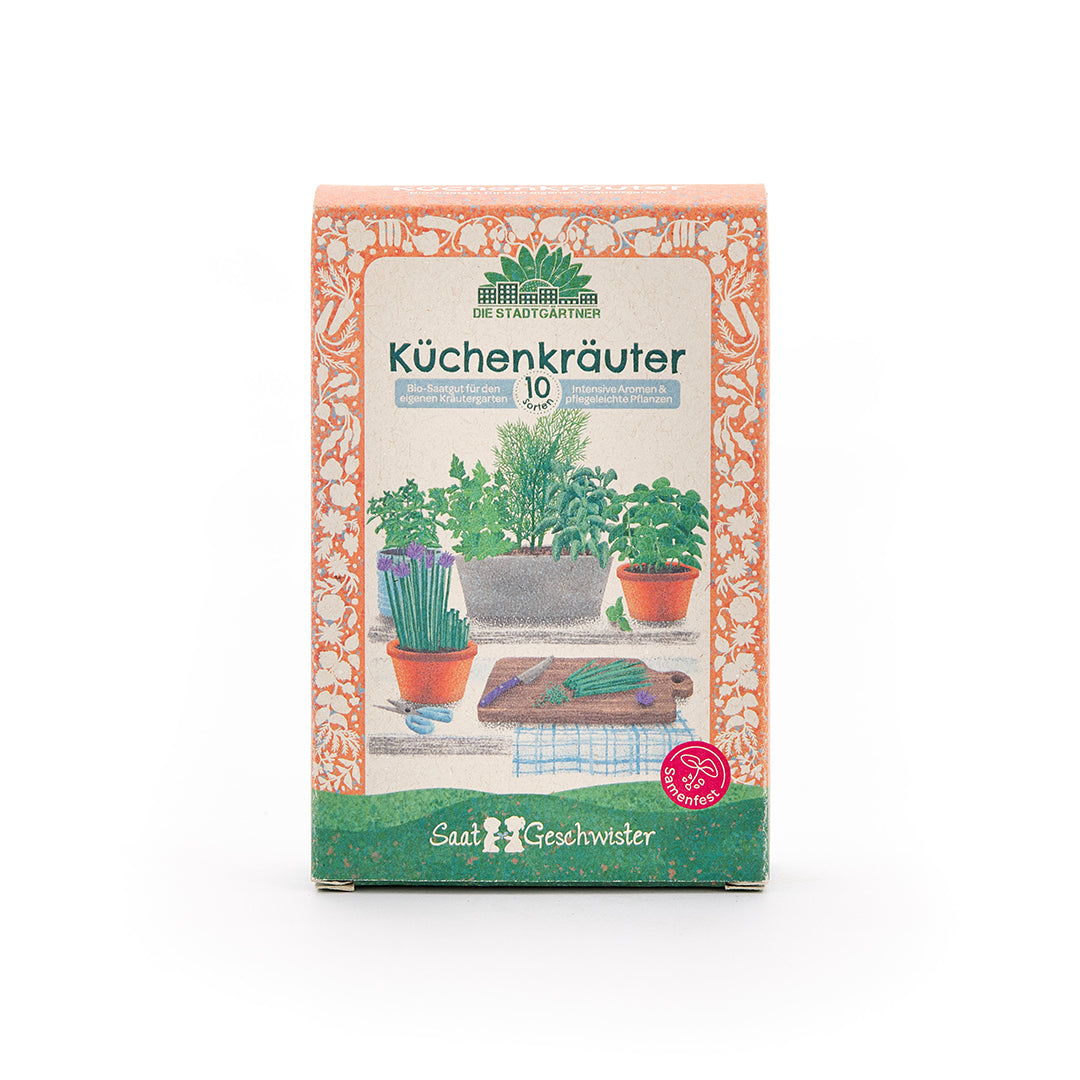 Verpackung für Küchenkräuter-Saatgut mit Illustrationen von Kräutertöpfen und einem Schneidebrett auf der Vorderseite.