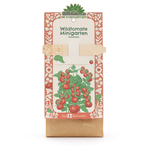 Anzuchtset „Wildtomate Minigarten“ von Die Stadtgärtner, Verpackung mit Illustration einer Tomatenpflanze und Holzstecker.