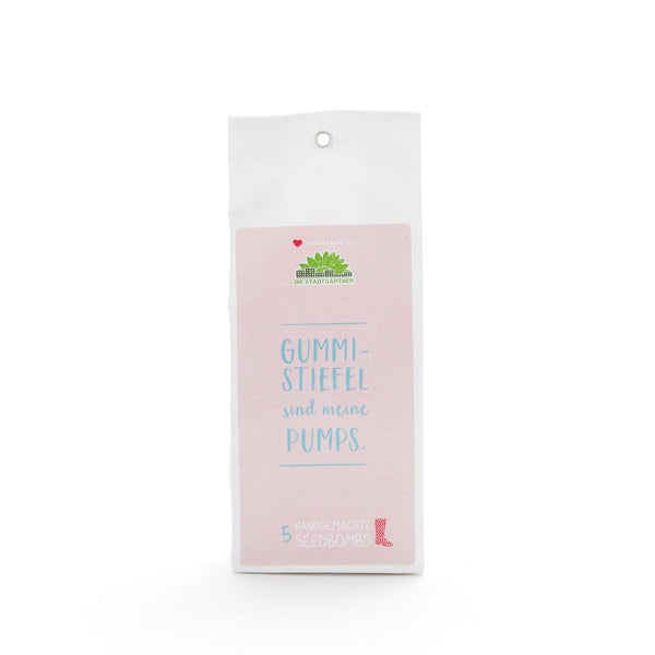 Verpackung von handgemachten Seedbombs mit dem Text "Gummistiefel sind meine Pumps."