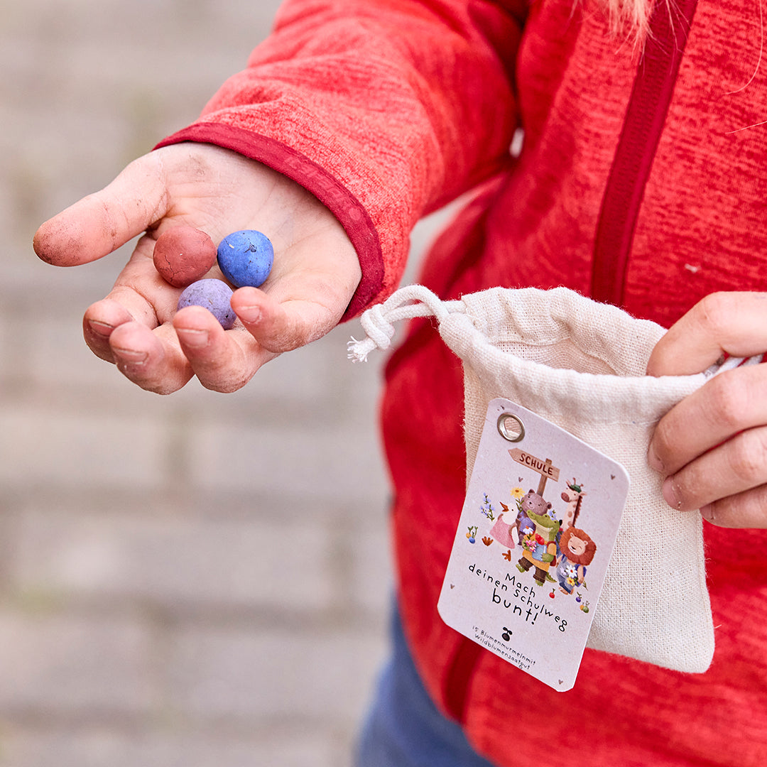 15 zaadkogels in een katoenen zakje