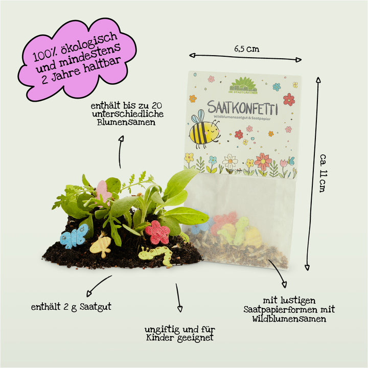 Ein Tütchen "Saatkonfetti" mit bunten Saatpapierformen und Wildblumensamen, daneben wachsen Pflanzen und Saatpapierfiguren aus Erde; Text weist auf ökologische, kinderfreundliche und nachhaltige Eigenschaften hin.