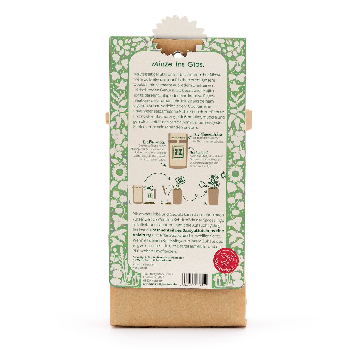 Rückseite einer Verpackung mit Anleitung zur Anzucht von Minze im Glas, umgeben von grün-weißem Blumenmuster.