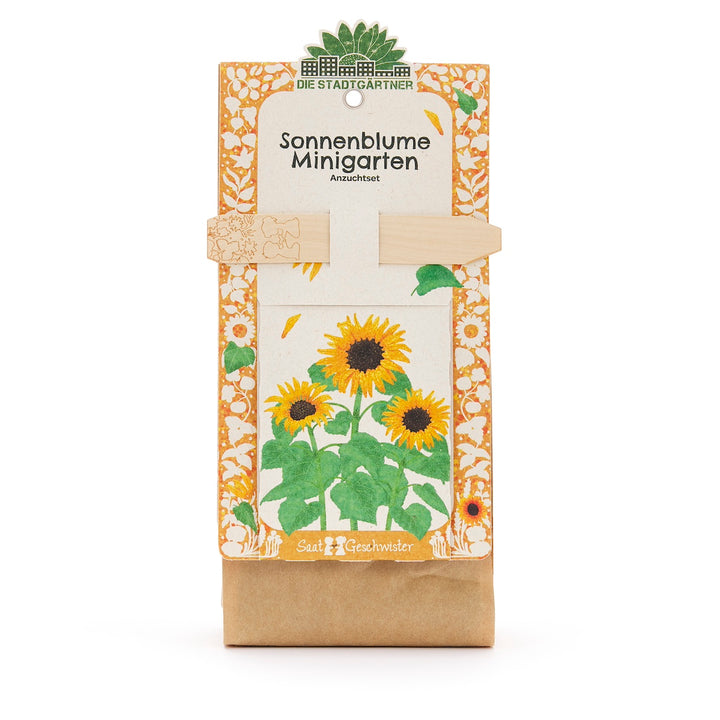 Sonnenblumen Minigarten Anzuchtset mit illustrierten Sonnenblumen auf der Verpackung.