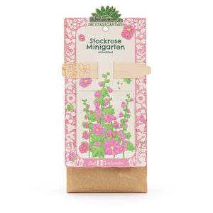 Stockrose Minigarten Anzuchtset mit bunter Blumenillustration auf der Verpackung.