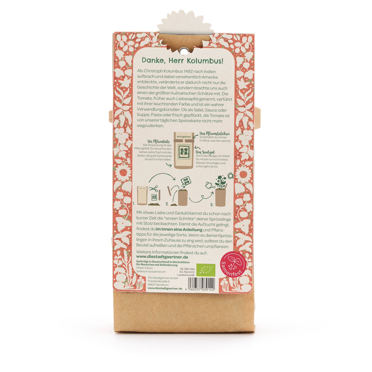 Rückseite einer Verpackung mit einer Anleitung zum Pflanzen von Tomaten, umgeben von einem roten Blumenmuster und deutschen Erklärungstexten.