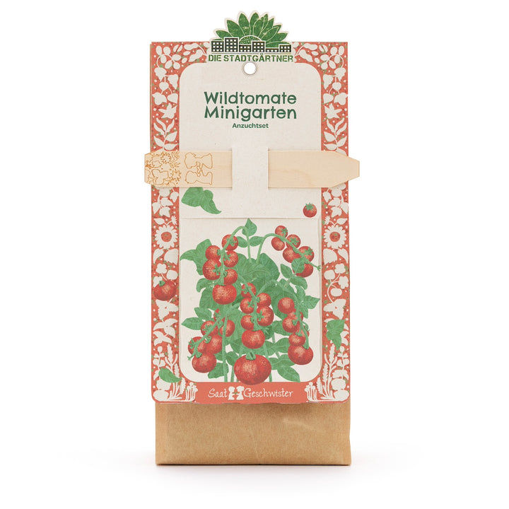 Anzuchtset „Wildtomate Minigarten“ von Die Stadtgärtner, Verpackung mit Illustration einer Tomatenpflanze und Holzstecker.