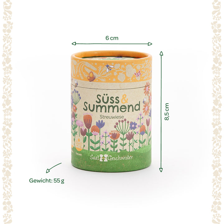 Runde Dose mit Blumenmotiv und Aufschrift „Süß & Summend Streuwiese“, Maße 6 cm Durchmesser, 8,5 cm Höhe, Gewicht 55 g.